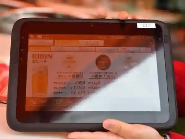 This picture shows a tablet provided at the table. Customers order food and drinks using this tablet.