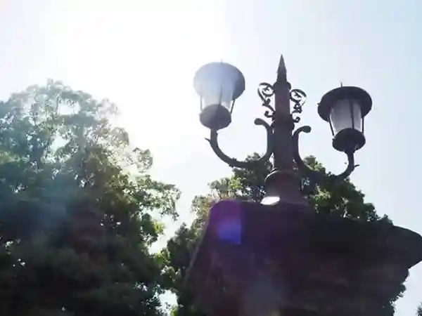 This photograph depicts an exterior light fixture at the Yurakumon Gate in Hibiya Park.