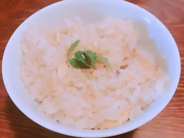 This photo shows rice cooked with bamboo shoots. Seasonal rice is served with your order of soba noodles. We had rice with bamboo shoots.