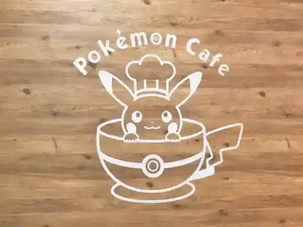 This illustration represents the logo of the Pokemon Cafe. It depicts Pikachu, dressed as a chef wearing a scarf and a cook's hat, inside a coffee cup.