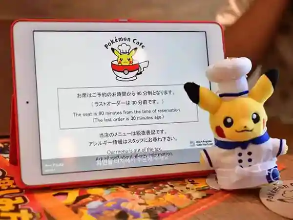 This photograph shows tablets on the table. Customers use these tablets to place orders at the Pokémon Café.