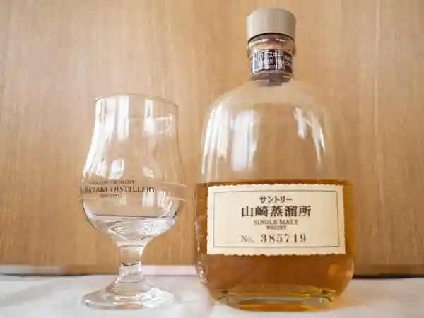 This photo is of a single malt whisky exclusively available at the Yamazaki Distillery. The whiskey bottle has a serial number.